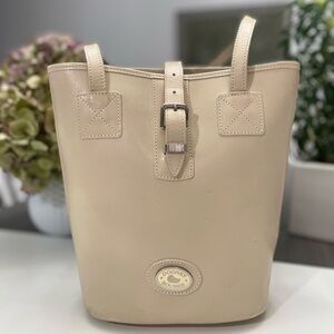 Vintage Dooney & Bourke All
Weather Leather Beige hand bag